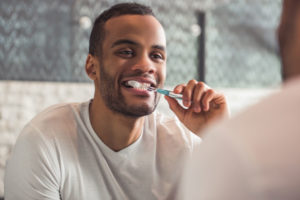 dental patient brushing teeth.